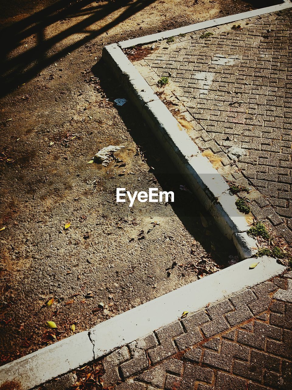 High angle view of cobblestone footpath