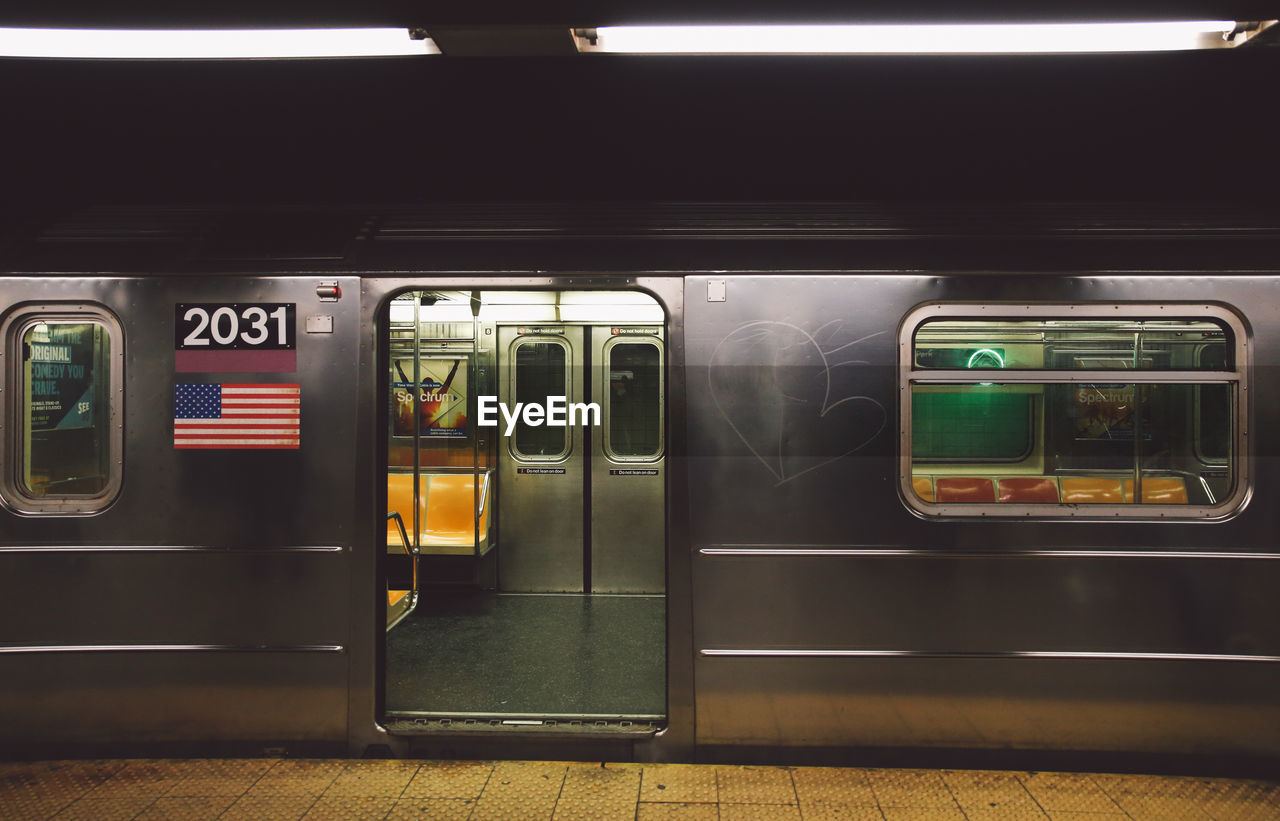 Open door of subway train at platform