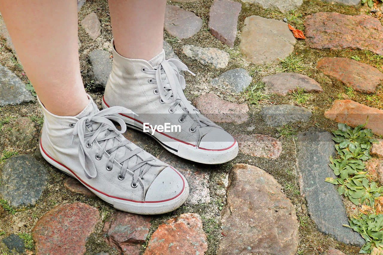 Berlin Photography Canvas Converse Body Part Canvas Shoe Day Footpath High Angle View Human Body Part Human Foot Human Leg Human Limb Leisure Activity Lifestyles Low Section Nature One Person Outdoors Real People Shoe Shoelace Sports Shoe Standing