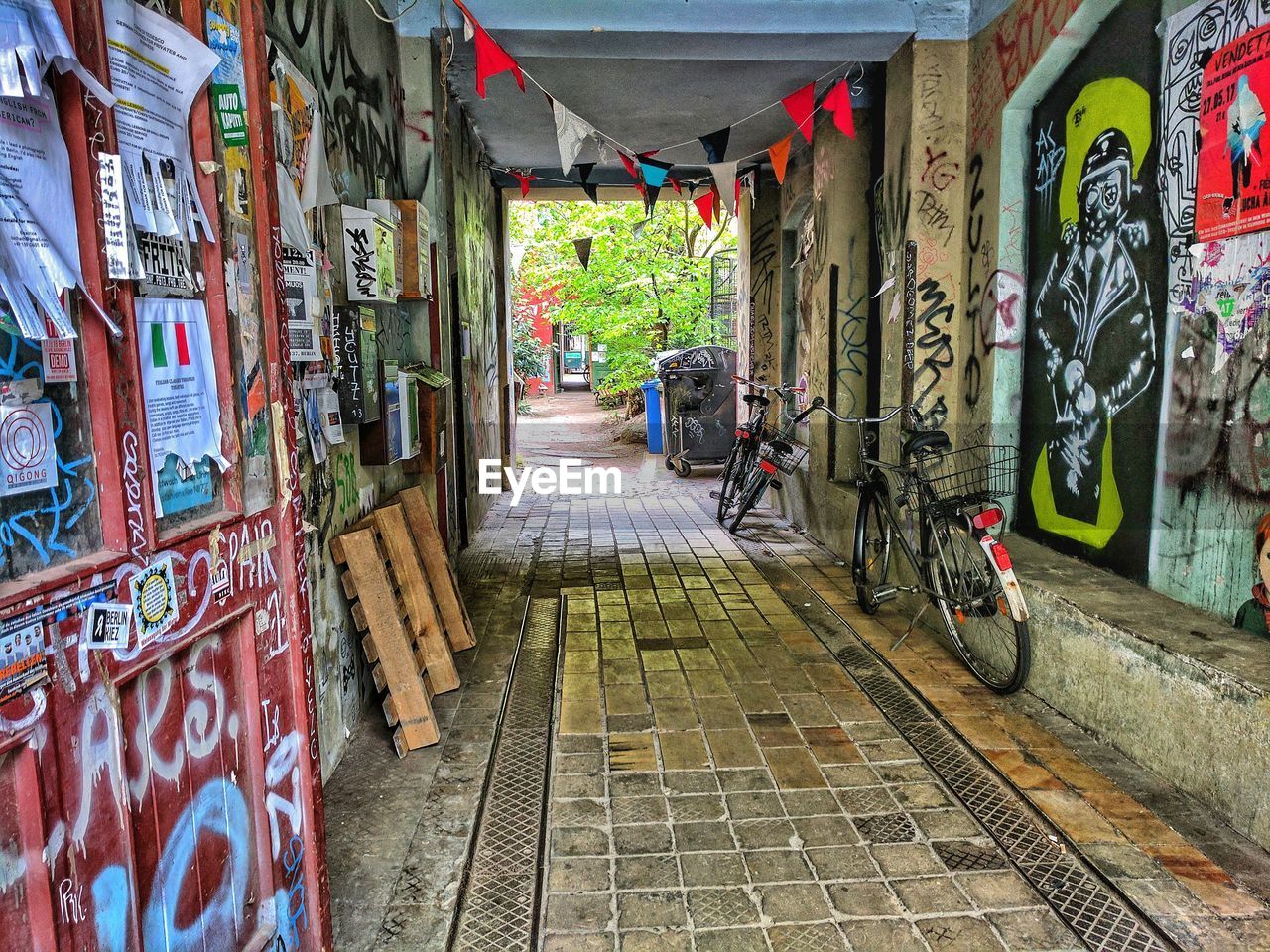 MAN WALKING ON BICYCLE LANE