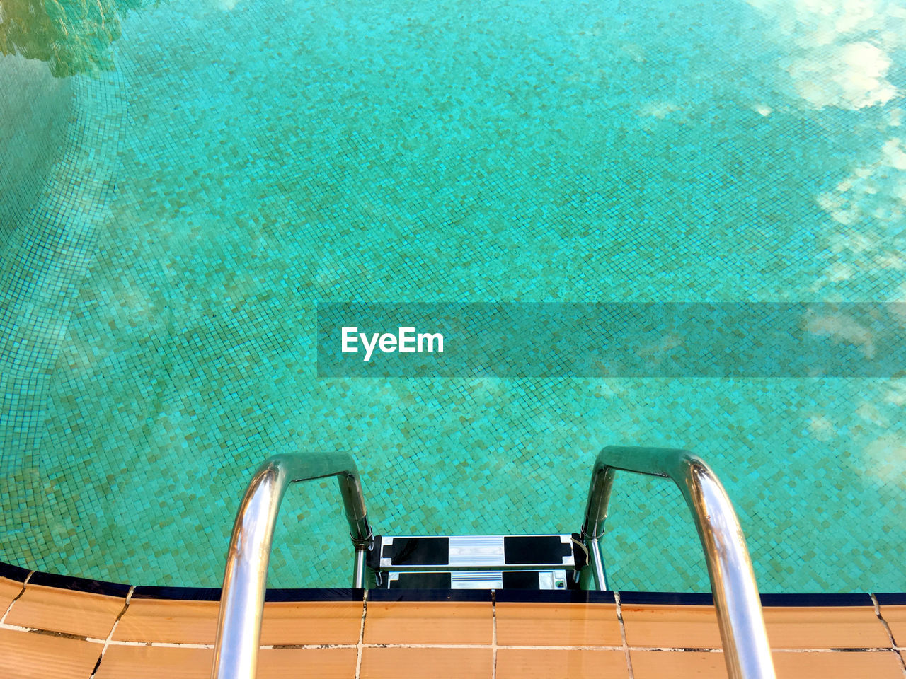 Close-up of ladder in swimming pool