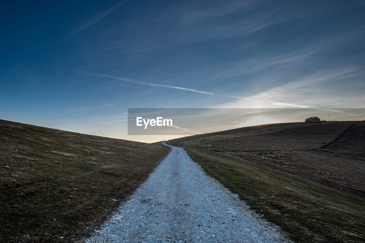 A lonely road on a hill in val formica - altopiano di asiago