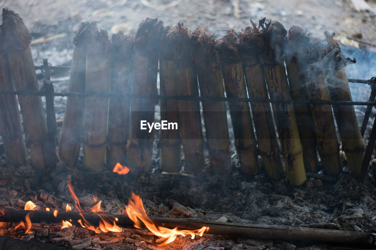 Panoramic view of bonfire on barbecue grill