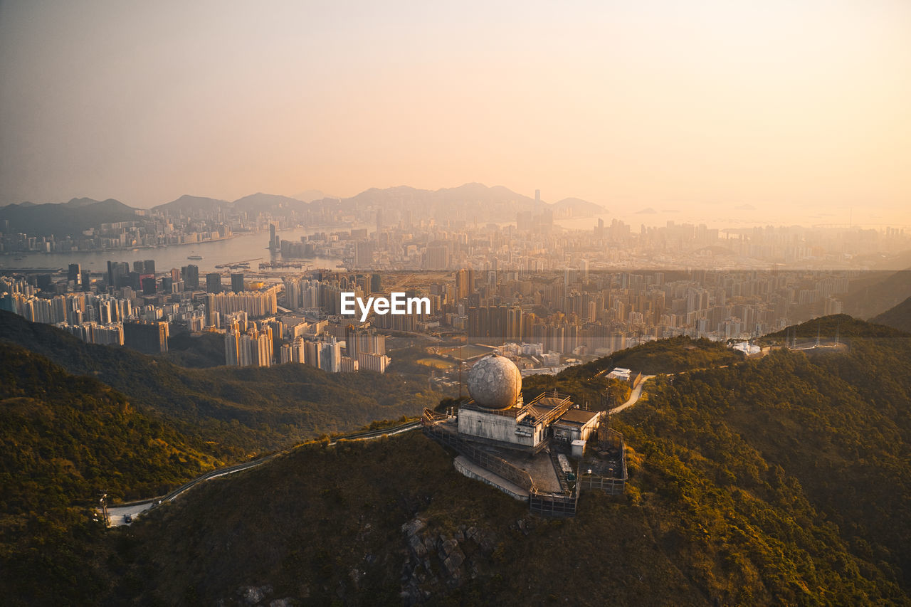 High angle view of townscape against sky during sunset