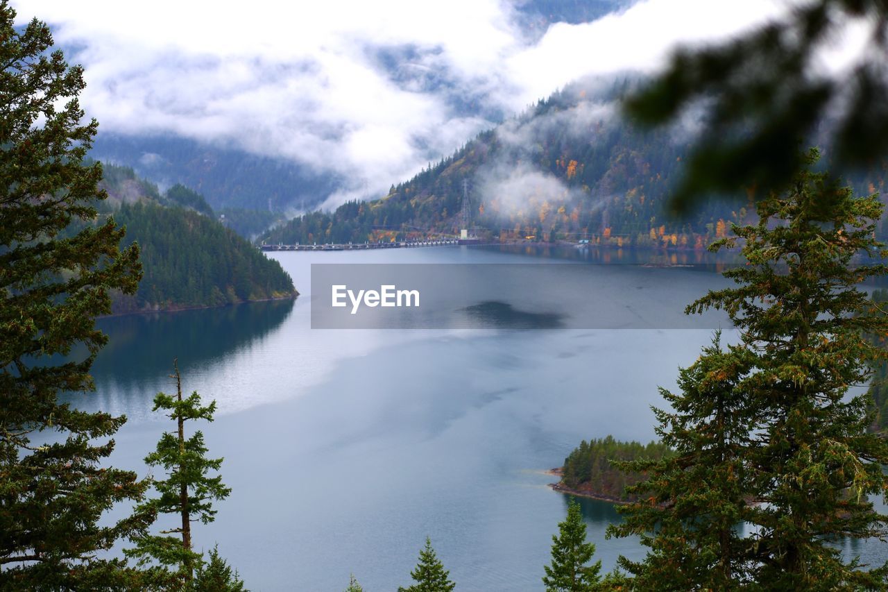 SCENIC VIEW OF LAKE AND MOUNTAINS