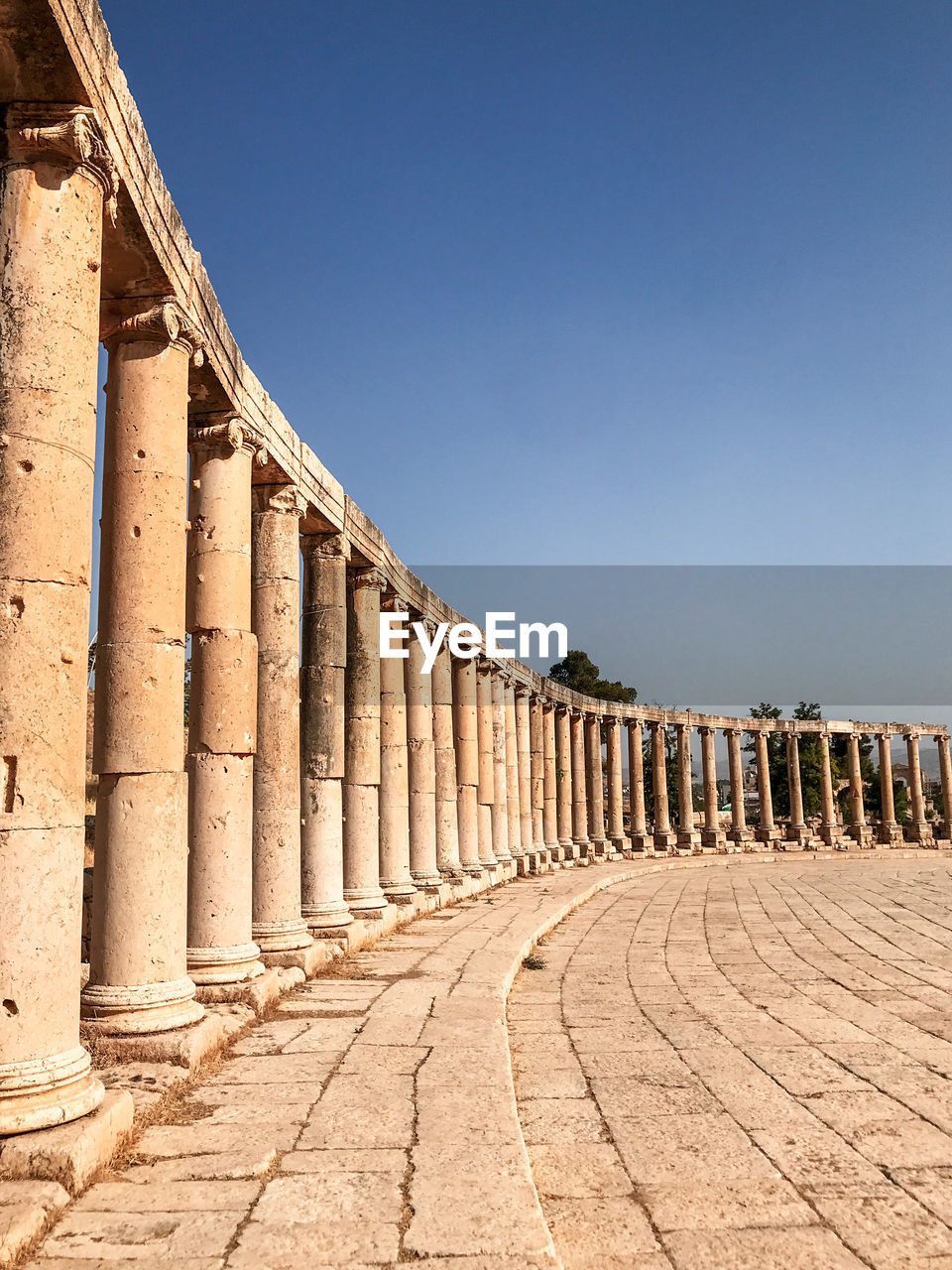 View of colonnade against clear sky