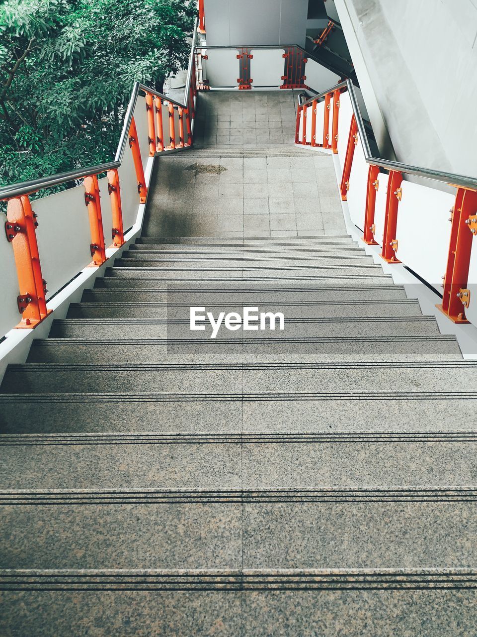 LOW ANGLE VIEW OF EMPTY STAIRCASE AMIDST BRIDGE
