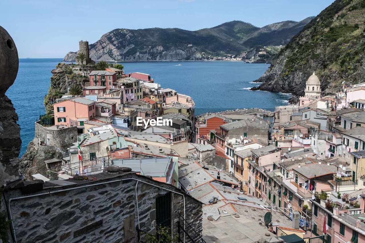 High angle view of town by sea