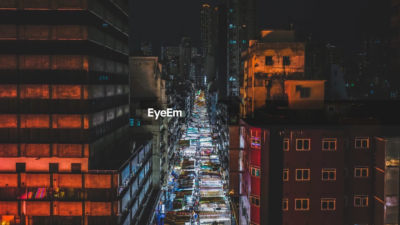 Buildings in city at night