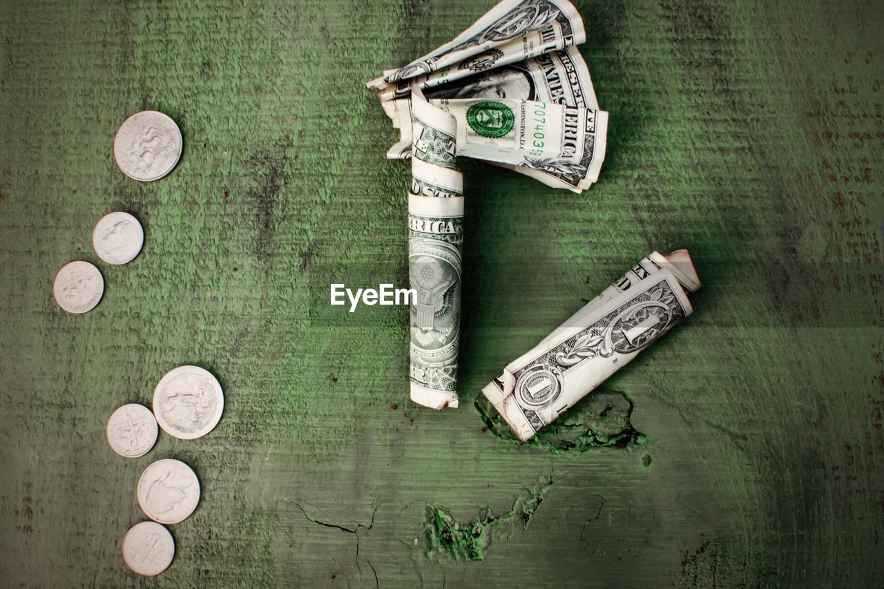 Directly above shot of currency on table