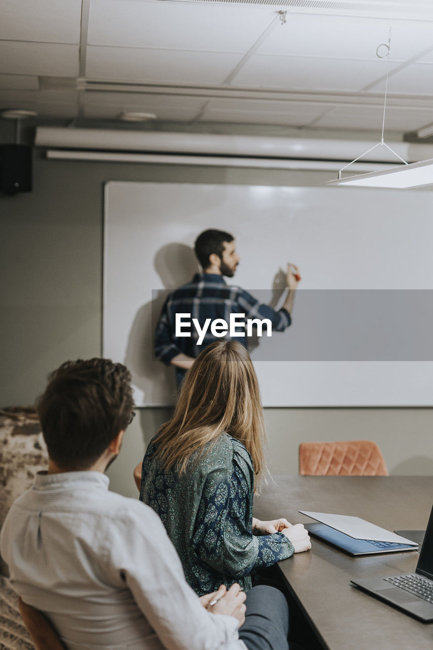 Man having presentation during business meeting