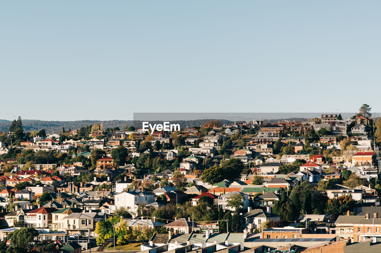 Aerial view of townscape against clear sky