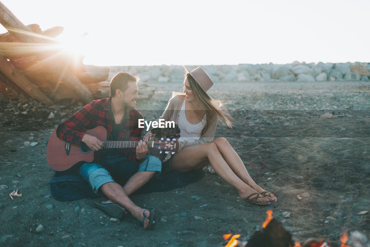 Young couple enjoying at beach