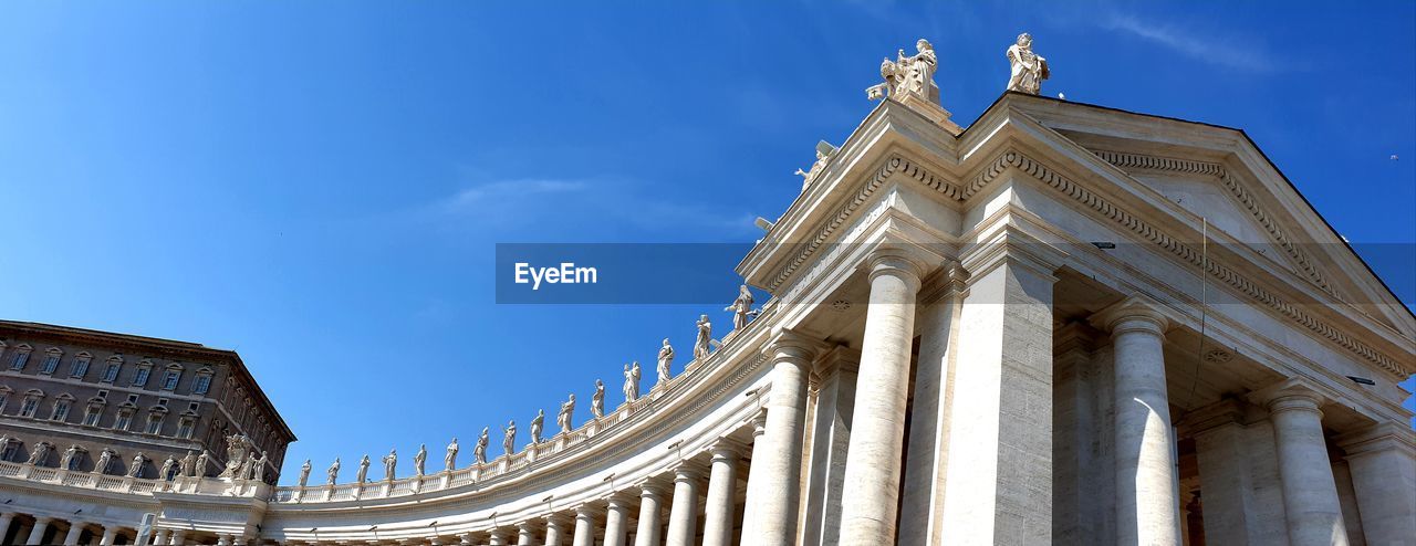 Low angle view of vatican building against sky