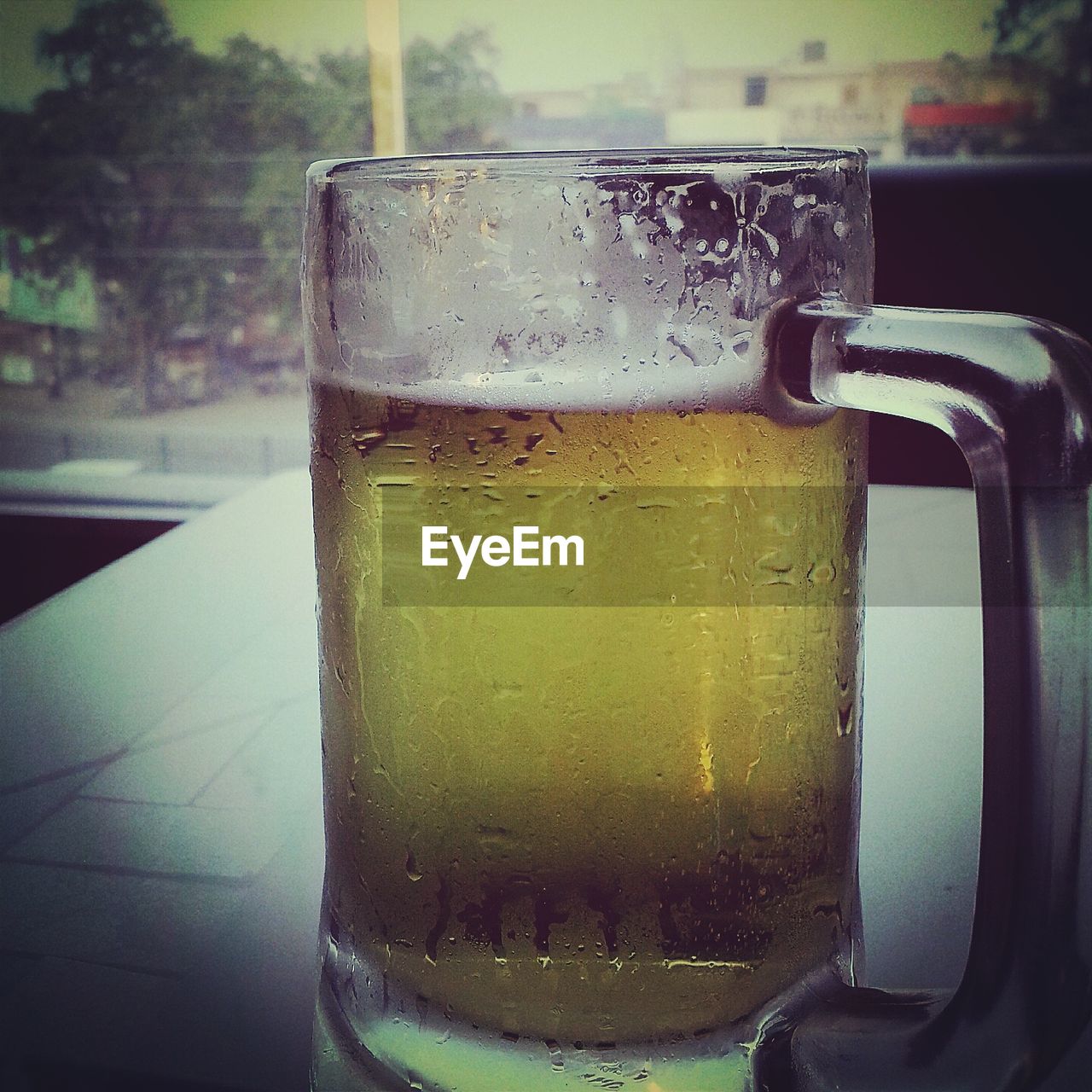 CLOSE-UP OF DRINK ON TABLE