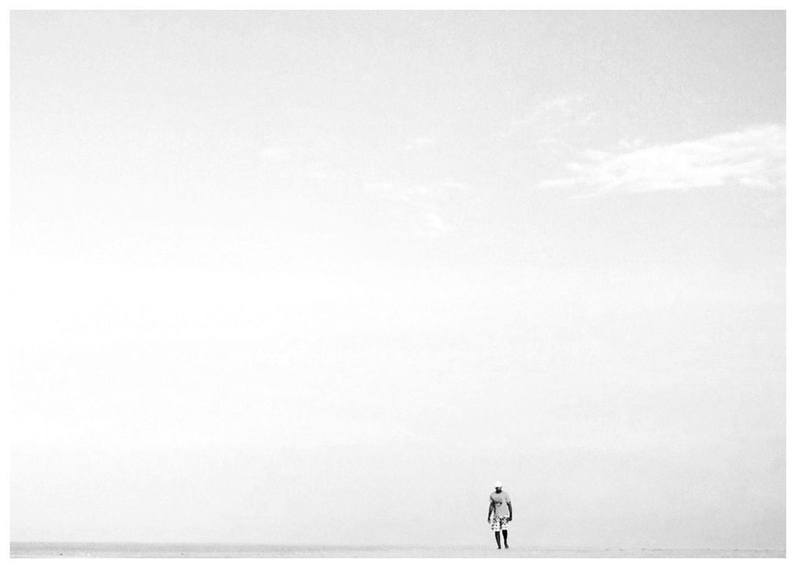 Full length of a man walking on beach