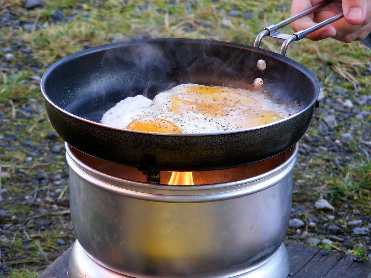 Close-up of making eggs in frying pan