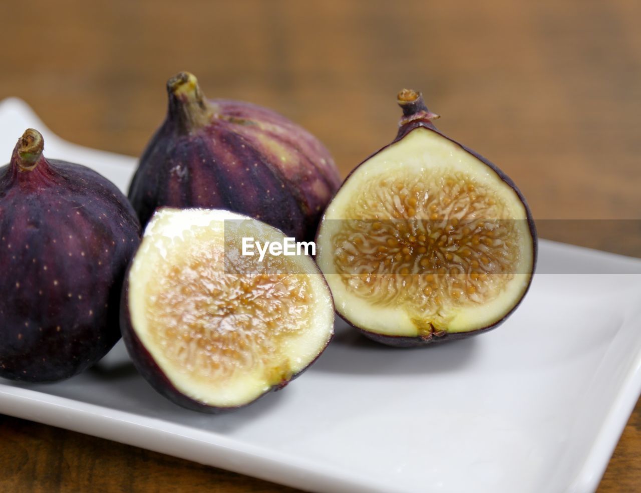 Close-up of figs on table