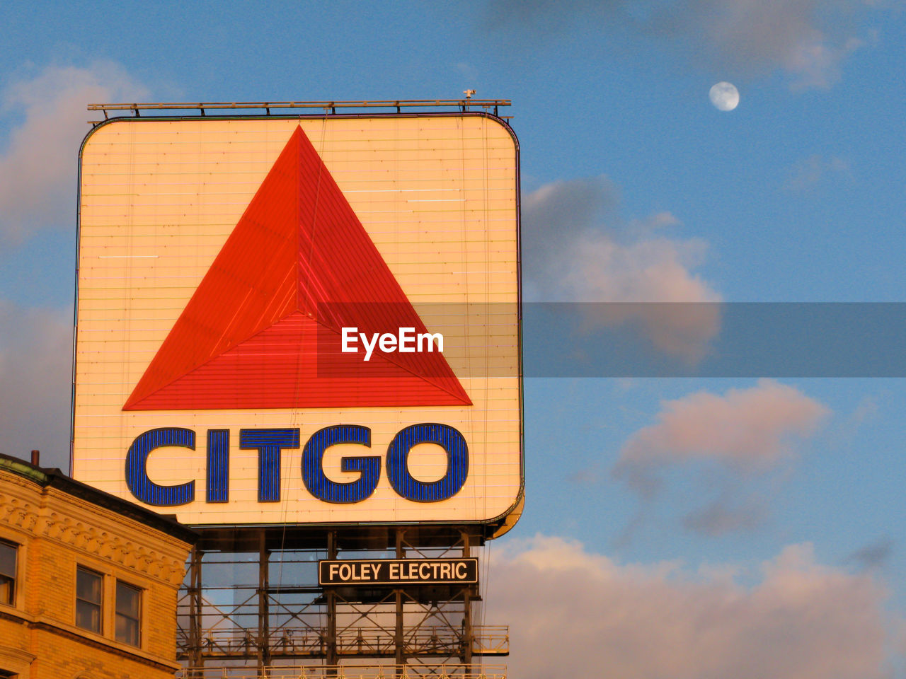 LOW ANGLE VIEW OF SIGNBOARD AGAINST SKY