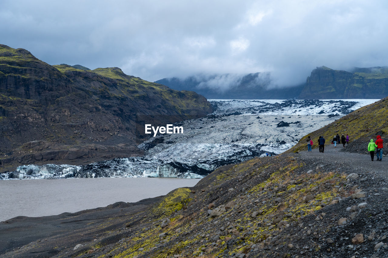 Scenic view of glacier against sky