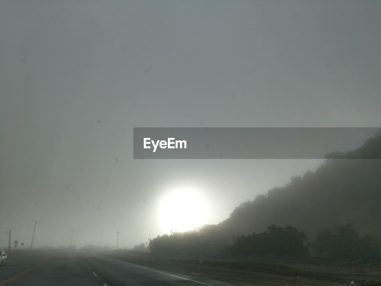 ROAD AGAINST CLEAR SKY DURING SUNRISE