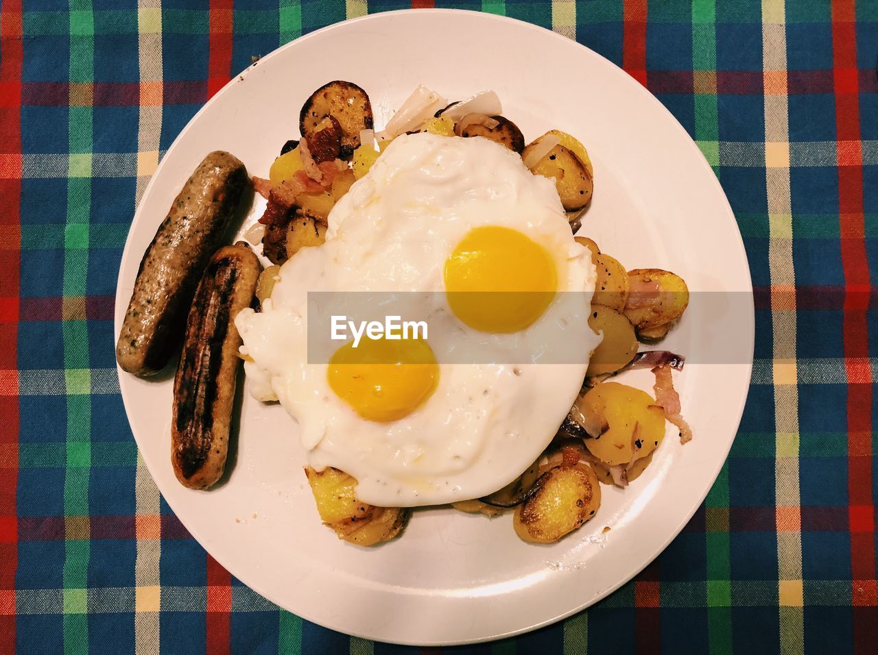 Directly above shot of breakfast in plant on table 