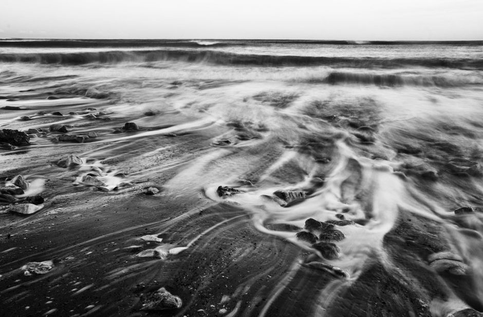 SCENIC VIEW OF SEA AT SUNSET