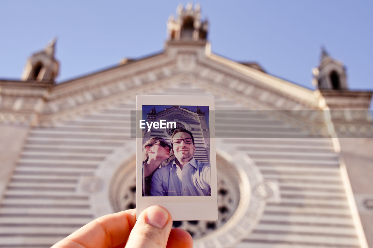 Photo in front of church against sky