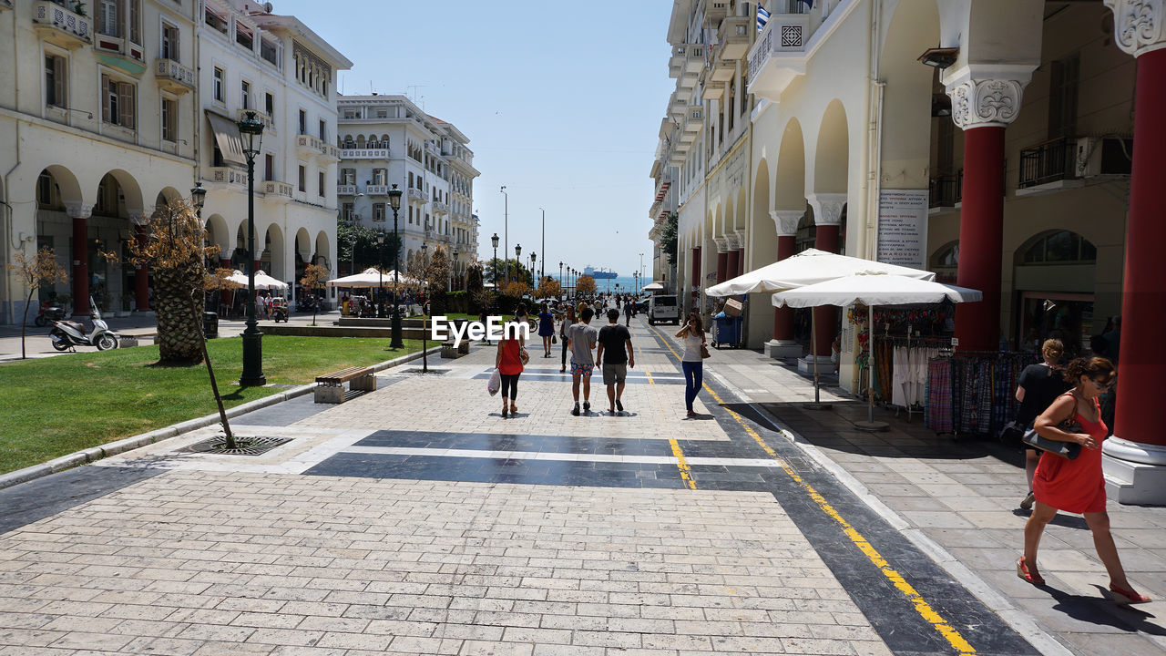 PEOPLE WALKING ON STREET