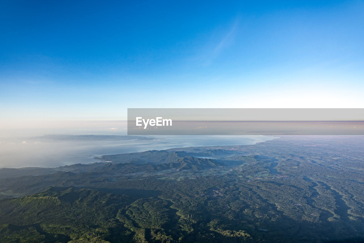 SCENIC VIEW OF LAND AGAINST CLEAR BLUE SKY