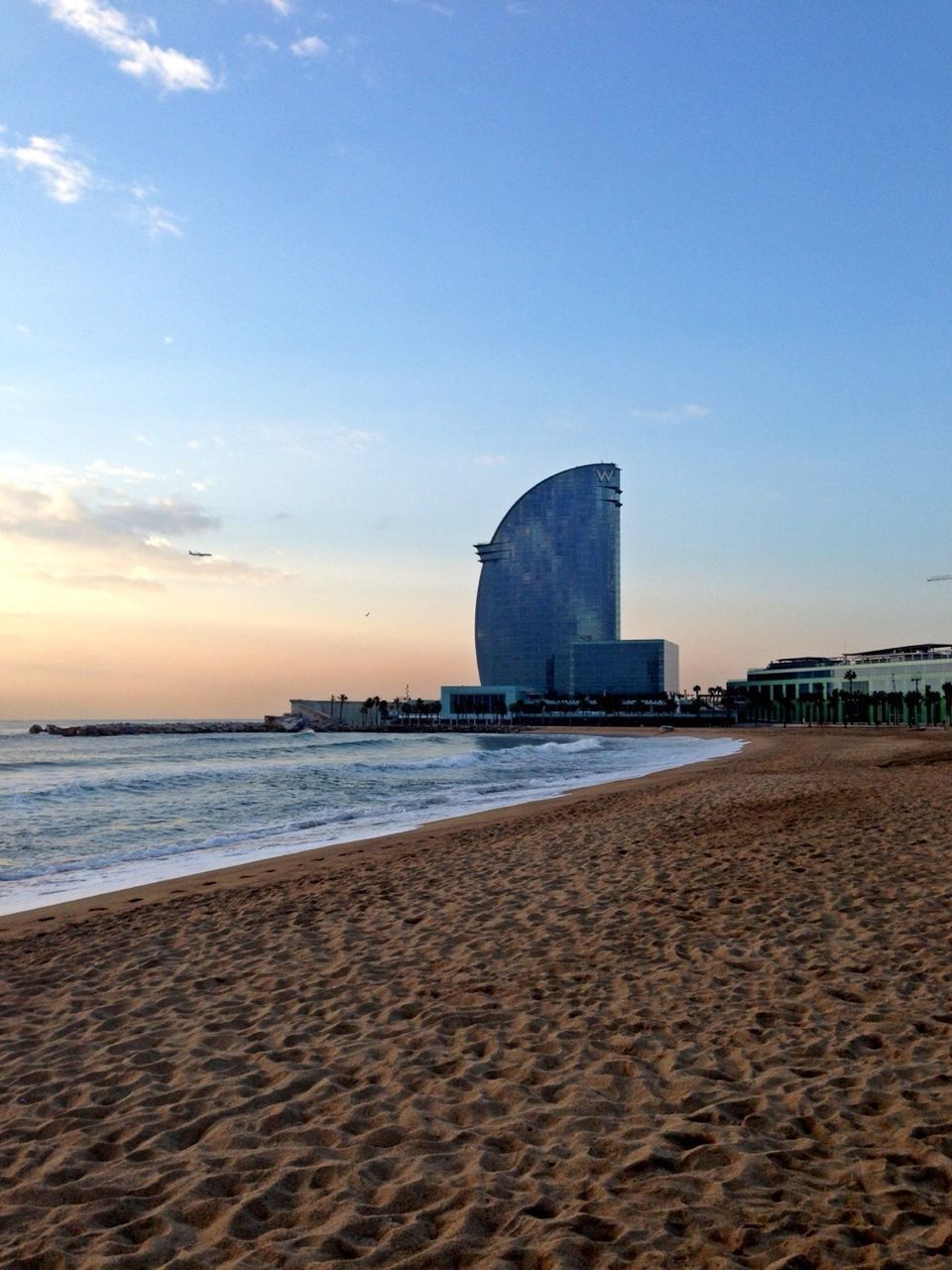 VIEW OF SEA WITH EIFFEL TOWER IN BACKGROUND