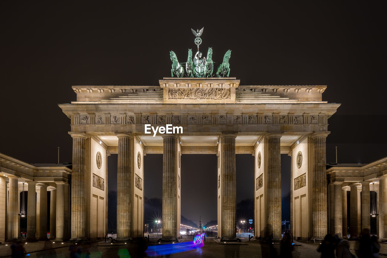 Low angle view of illuminated brandenburg gate at night