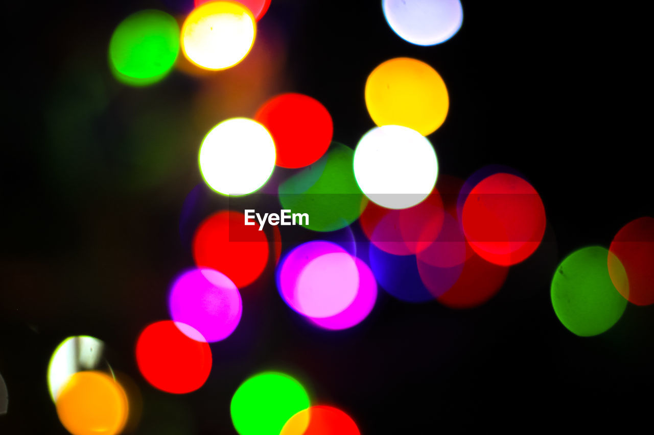 Defocused image of illuminated colorful lights