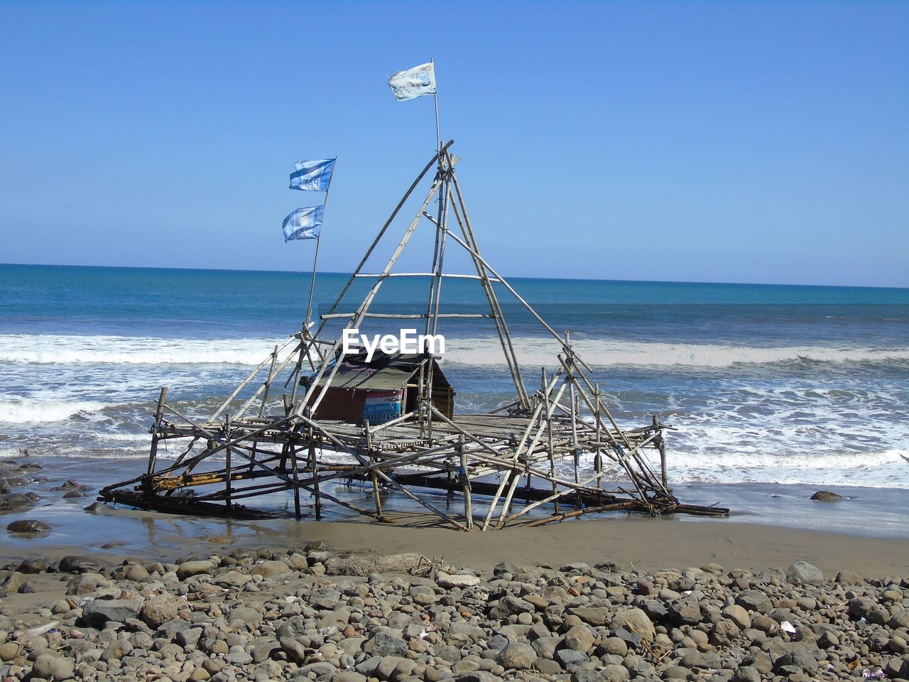 VIEW OF BEACH AGAINST CLEAR SKY