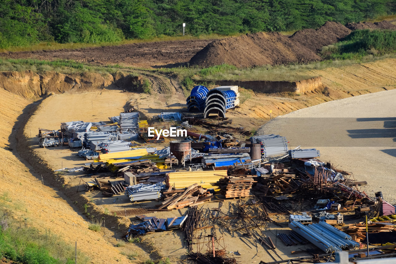 HIGH ANGLE VIEW OF CONSTRUCTION SITE AT DUSK