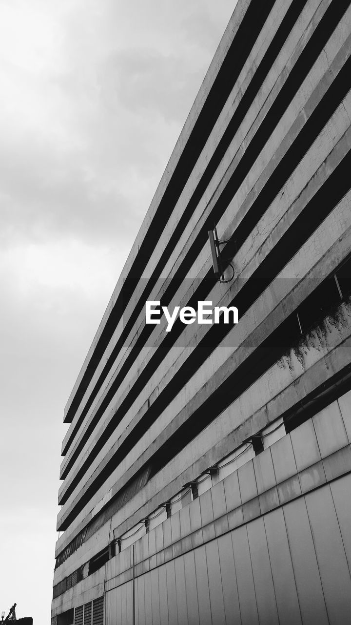 Low angle view of modern building against sky