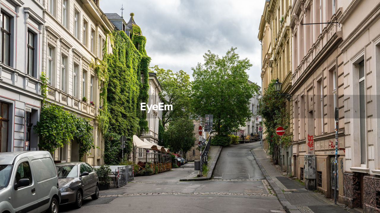 road amidst buildings in city