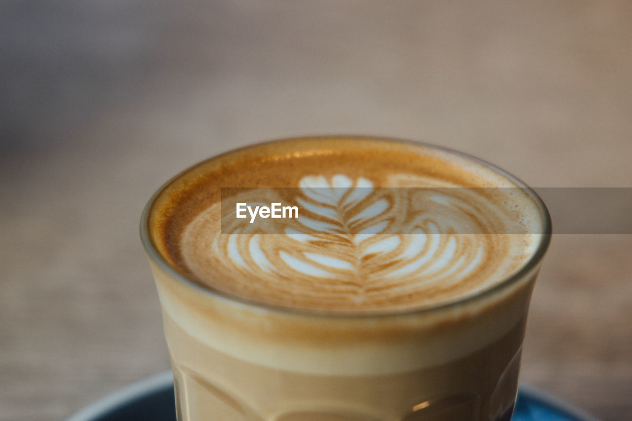 CLOSE-UP OF COFFEE ON TABLE