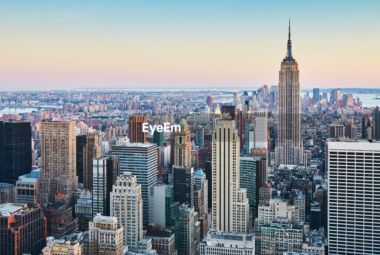 Horizontal shot of new york city from above at sunset