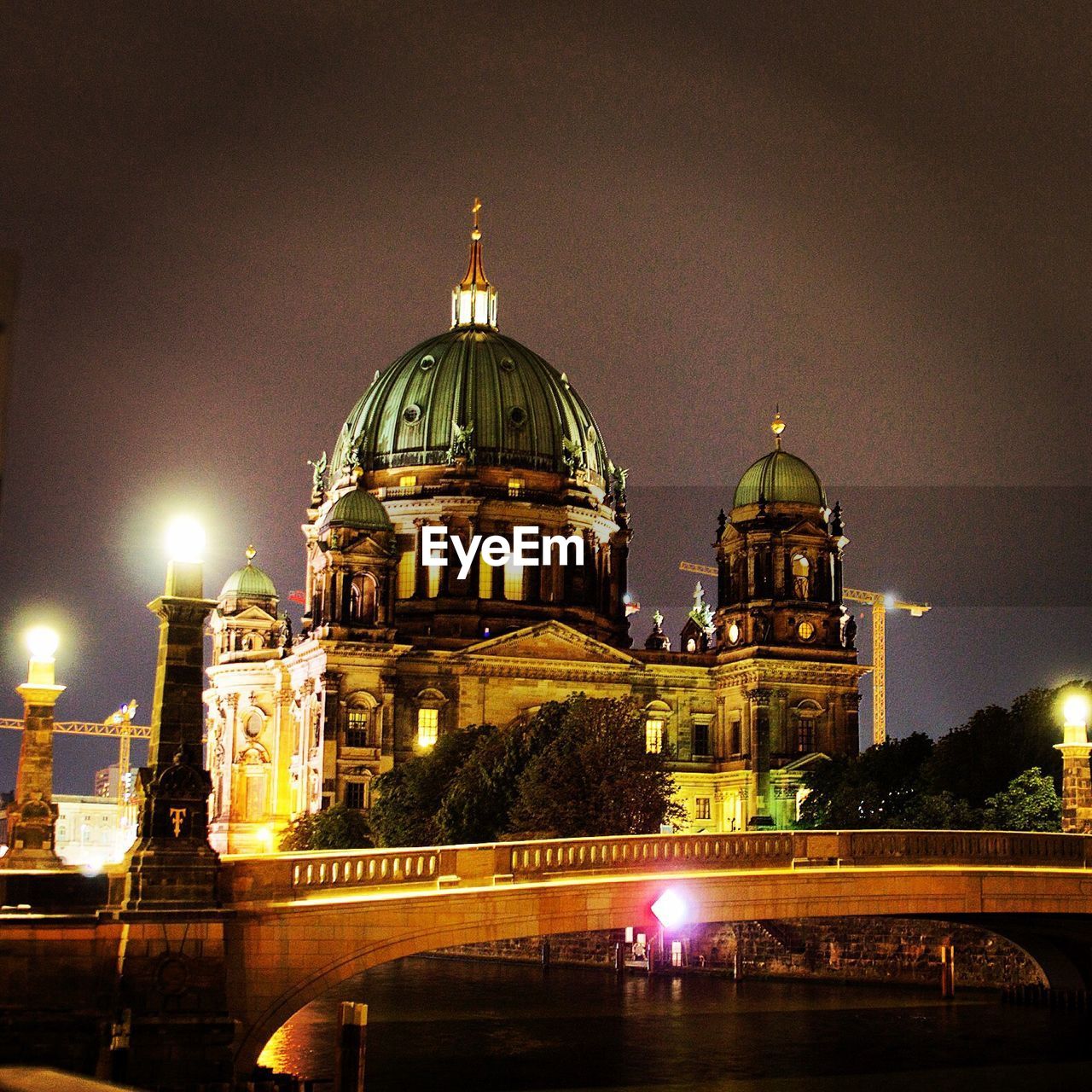 Illuminated berlin cathedral against sky at night