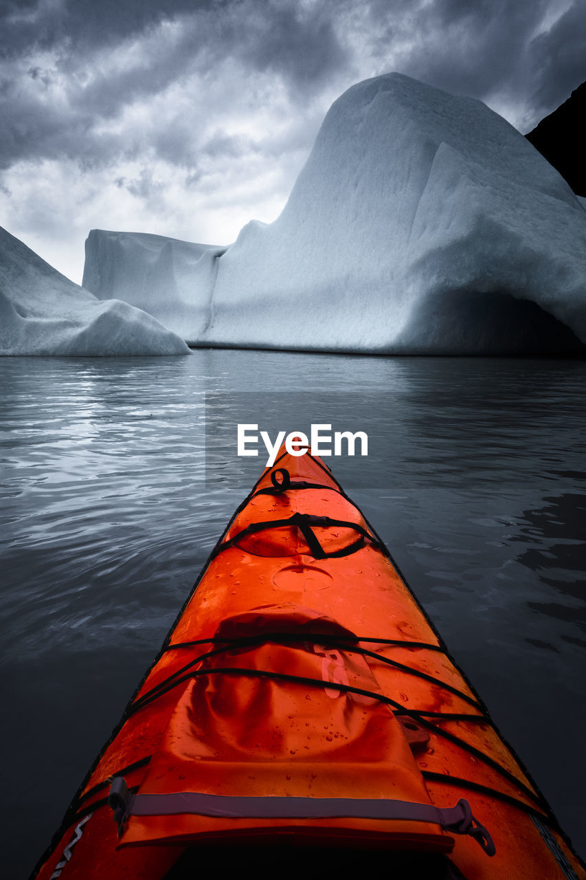 Kayaking in a ice lake alone without people