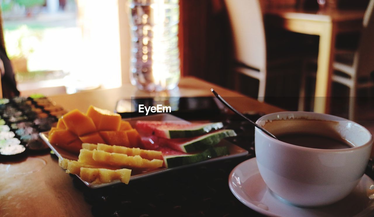 Close-up of breakfast served on table