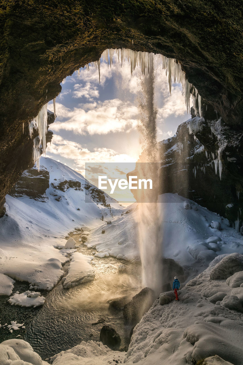 Man standing in cave