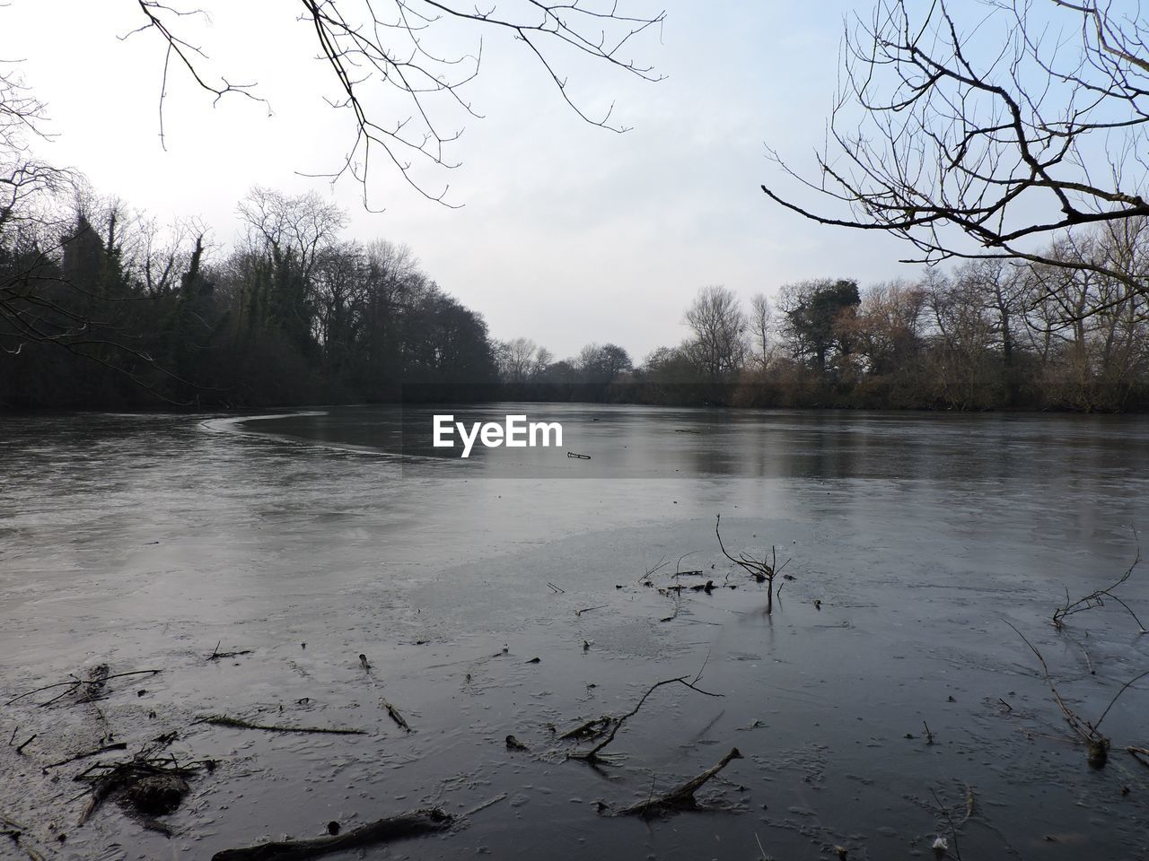 SCENIC VIEW OF LAKE DURING WINTER