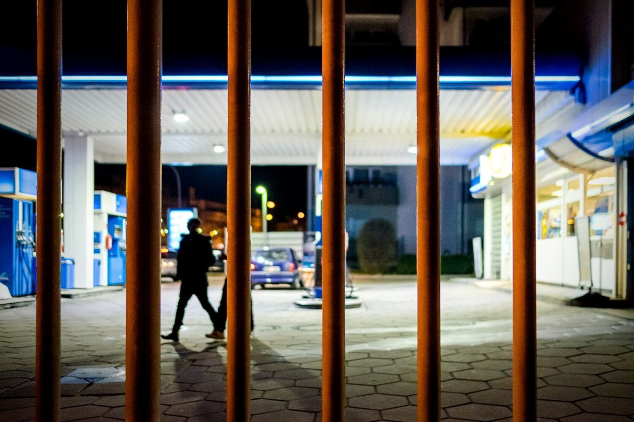 WOMAN WALKING ON CITY STREET