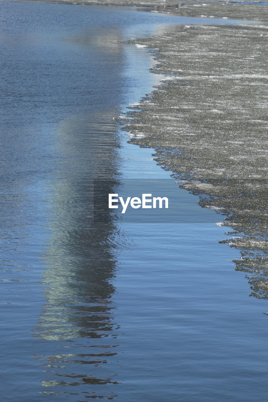 SCENIC VIEW OF RIPPLED LAKE