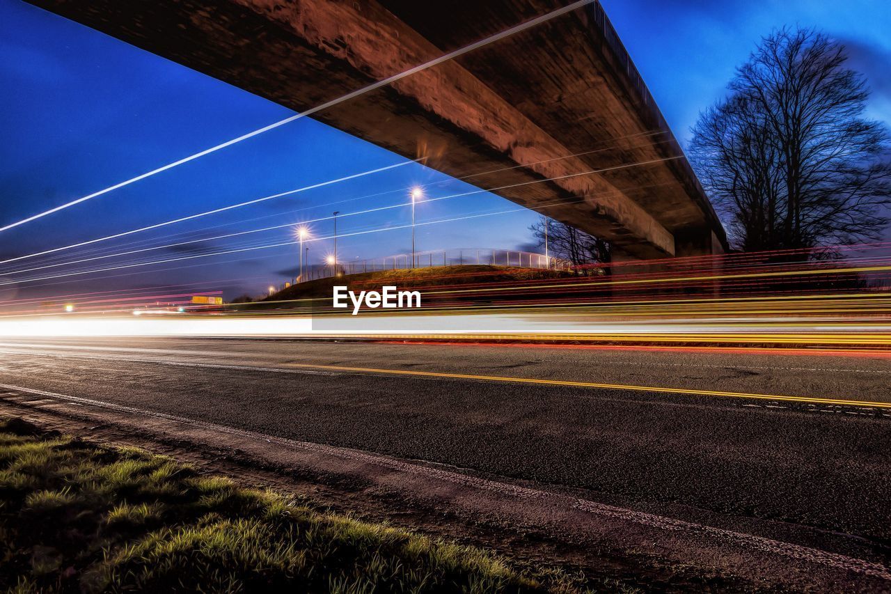 Light trails on road at night