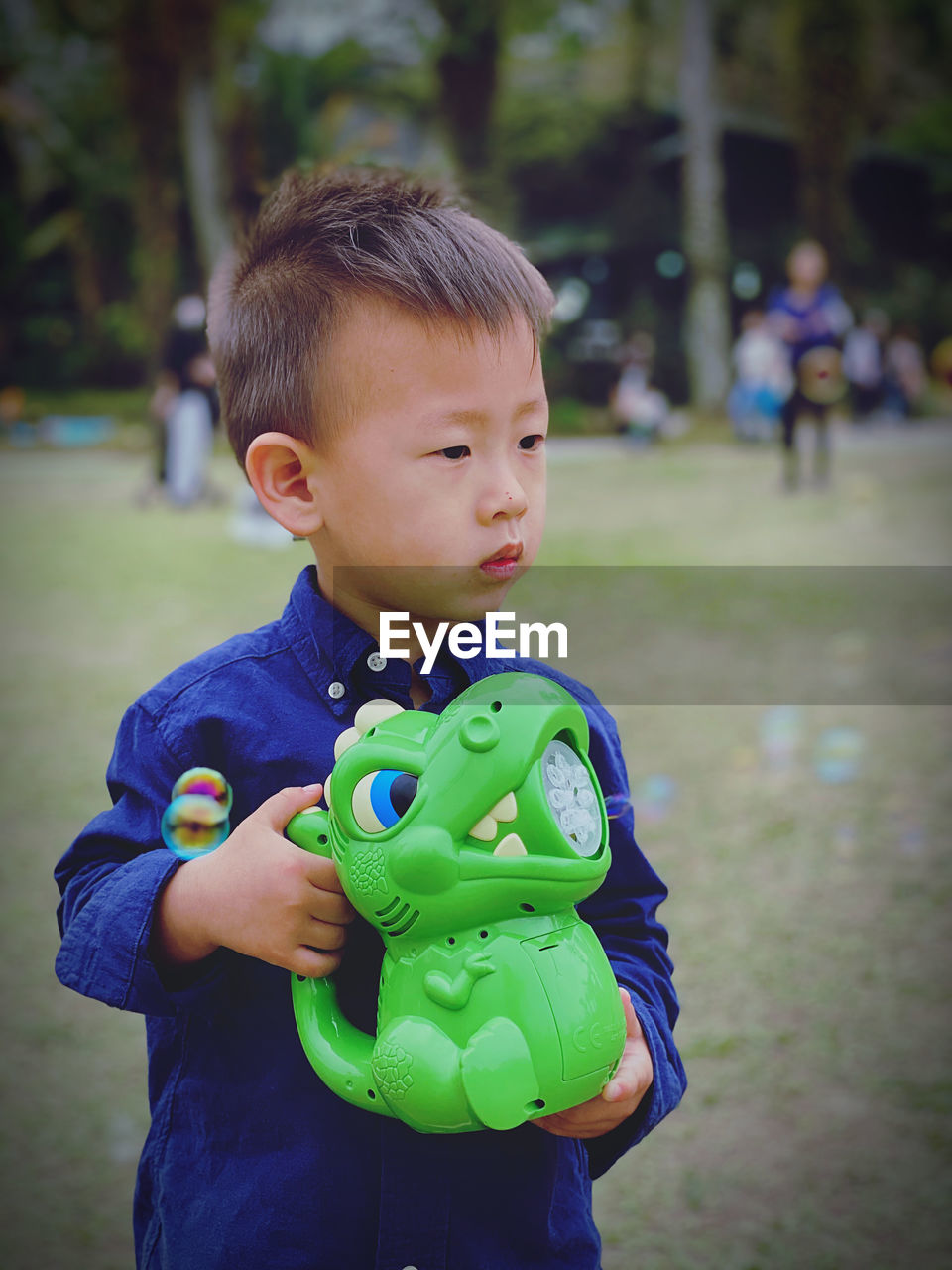portrait of cute baby boy with stuffed toy