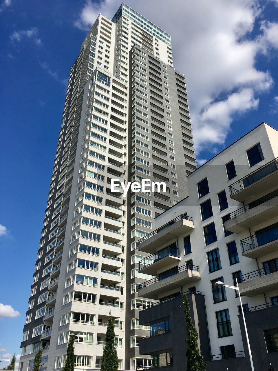 Low angle view of modern buildings against sky