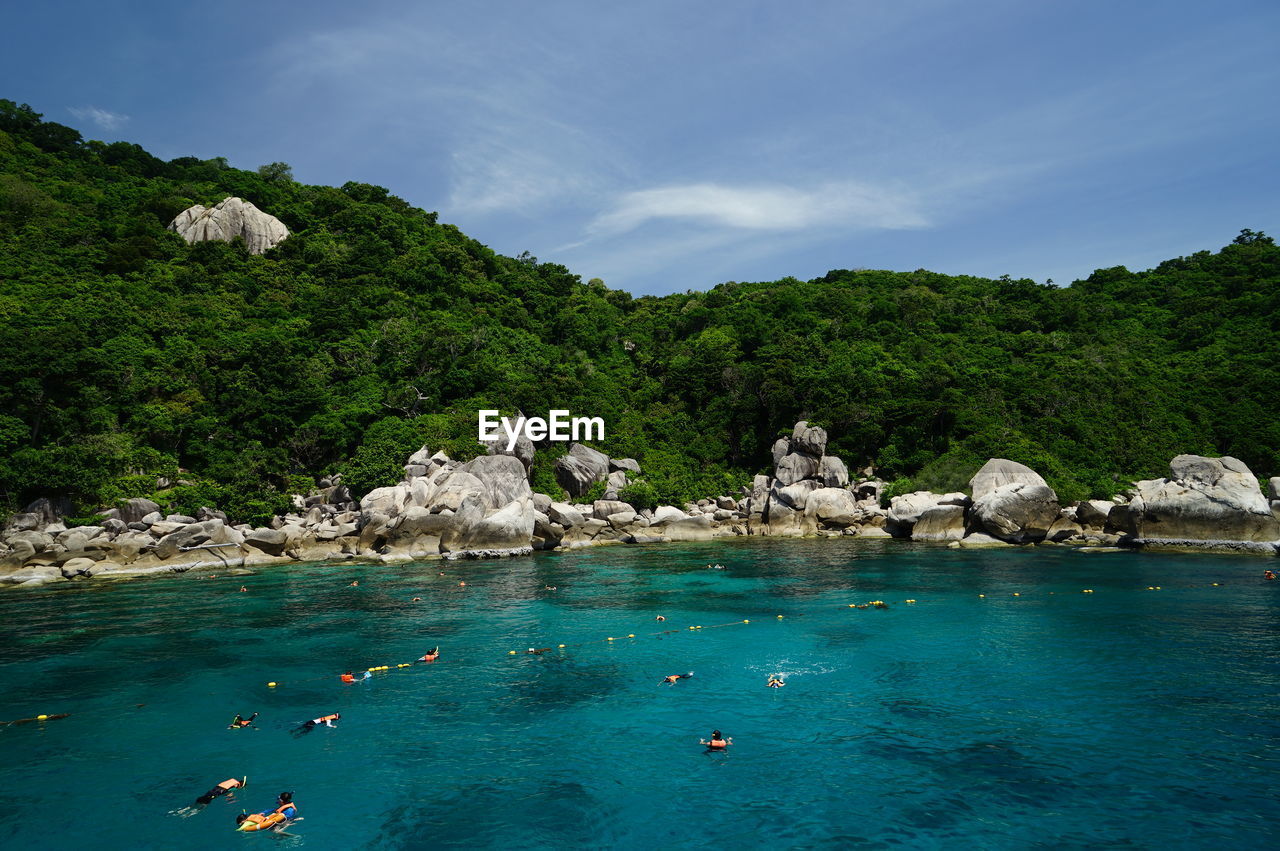 Scenic view of sea against blue sky